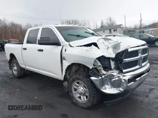 2014 Ram 2500 Tradesman z VIN 3C6UR5CL8EG222659, wystawiony jako IAAI lot #41734029 z przebiegiem 183 826 mil mil oraz . Historia ofert i sprzedaży dostępna na DreamBid. Obrazek 1.
