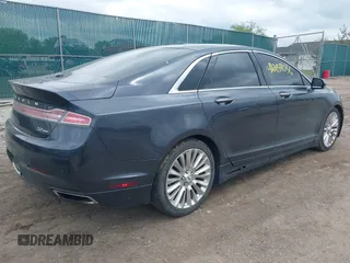 2013 Lincoln MKZ z VIN 3LN6L2G90DR827936, wystawiony jako IAAI lot #42259036 z przebiegiem 145 304 mil mil oraz . Historia ofert i sprzedaży dostępna na DreamBid. Obrazek 4.