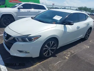 2018 Nissan Maxima SV z VIN 1N4AA6AP8JC375978, wystawiony jako IAAI lot #42115071 z przebiegiem 136 887 mil mil oraz . Historia ofert i sprzedaży dostępna na DreamBid. Obrazek 2.