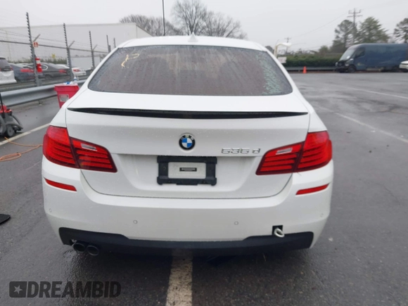 2014 BMW 5 Series 535d with VIN WBAXA5C58ED690612, listed as a IAAI auction lot 41570616 with 95,124 mi miles and . Bid and sale history available at carsss.com. Image 17.
