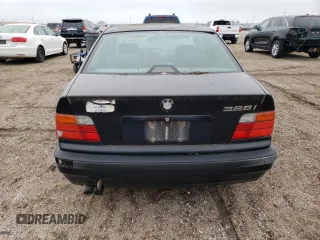 1998 BMW 3 Series 328iA with VIN WBACD4323WAV62464, listed as a Copart auction lot 66717014 with 0 mi miles and Clean Title. Bid and sale history available at carsss.com. Image 6.