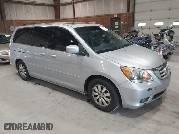 2010 Honda Odyssey EX-L z VIN 5FNRL3H75AB009698, wystawiony jako IAAI lot #42855966 z przebiegiem 215 138 mil mil oraz . Historia ofert i sprzedaży dostępna na DreamBid. Obrazek 1.