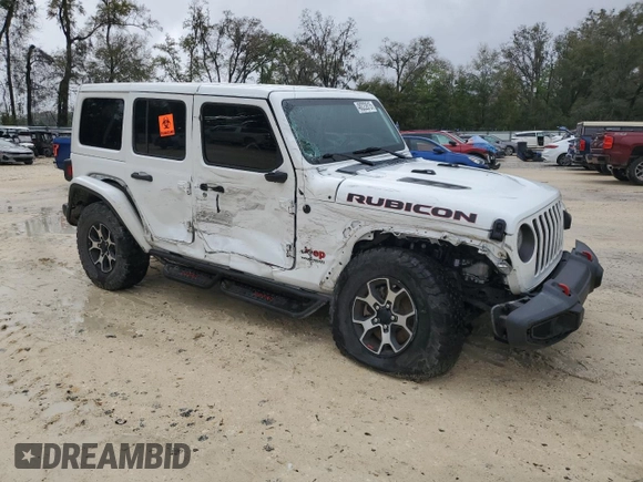 2022 Jeep Wrangler Unlimited Rubicon with VIN 1C4HJXFNXNW133624, listed as a Copart auction lot 48222615 with 51,849 mi miles and Salvage title. Bid and sale history available at DreamBid. Image 4.