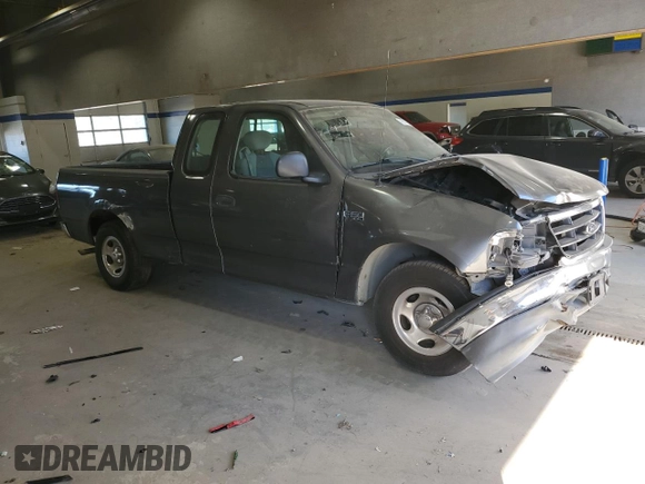2003 Ford F-150 XL with VIN 1FTRX17263NA82310, listed as a Copart auction lot 76577354 with Not provided miles and Salvage title. Bid and sale history available at DreamBid. Image 4.