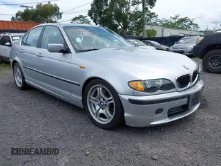 2002 BMW 3 Series 330i with VIN WBAEV53402KM15066, listed as a IAAI auction lot 42053080 with Not Provided miles and . Bid and sale history available at carsss.com. Image 1.