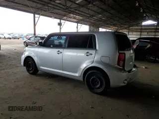 2012 Scion xB with VIN JTLZE4FE5CJ023537, listed as a Copart auction lot 55863315 with 230,648 mi miles and Salvage Title. Bid and sale history available at DreamBid. Image 2.