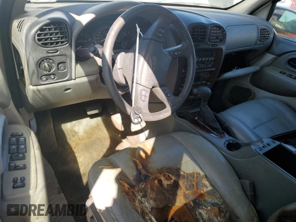 2004 Oldsmobile Bravada z VIN 1GHDT13S442104765, wystawiony jako Copart lot #76459714 z przebiegiem Nie podano mil oraz Nie do naprawy • Non repairable. Historia ofert i sprzedaży dostępna na DreamBid. Obrazek 8.