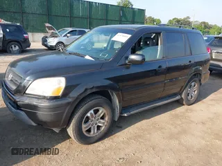 2003 Honda Pilot EX z VIN 2HKYF18763H605799, wystawiony jako IAAI lot #42478003 z przebiegiem 216 563 mil mil oraz . Historia ofert i sprzedaży dostępna na DreamBid. Obrazek 2.