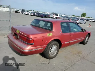 1997 Mercury Cougar z VIN 1MELM62W6VH618680, wystawiony jako Copart lot #53379985 z przebiegiem 123 474 mil mil oraz Szkody całkowita. Historia ofert i sprzedaży dostępna na DreamBid. Obrazek 3.