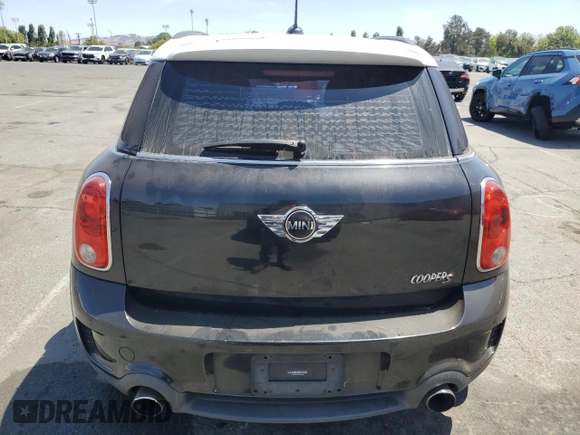 2013 MINI Countryman S ALL4 with VIN WMWZC5C52DWP30625, listed as a Copart auction lot 62772395 with 129,498 mi miles and Salvage title. Bid and sale history available at DreamBid. Image 6.