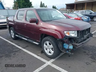 2009 Honda Ridgeline RTL with VIN 5FPYK16539B101836, listed as a IAAI auction lot 41894409 with 185,325 mi miles. Bid and sale history available at carsss.com. Image 1.