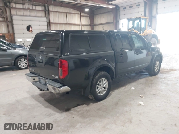 2019 Nissan Frontier SV with VIN 1N6AD0EV9KN714516, listed as a IAAI auction lot 42296632 with 159,606 mi miles and . Bid and sale history available at DreamBid. Image 4.