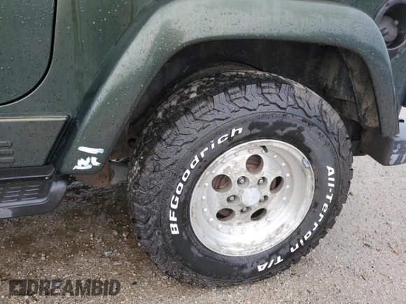 1997 Jeep Wrangler Sahara with VIN 1J4FY49SXVP453369, listed as a Copart auction lot 72826744 with 145,852 mi miles and Salvage Title. Bid and sale history available at carsss.com. Image 13.