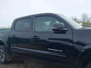 2018 Toyota Tacoma SR5 with VIN 3TMAZ5CN6JM055632, listed as a IAAI auction lot 40751593 with 125,663 mi miles and . Bid and sale history available at DreamBid. Image 14.