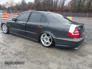 2003 Mercedes-Benz E-Class 5.5L AMG with VIN WDBUF76JX3A267197, listed as a IAAI auction lot 41485778 with 89,310 mi miles. Bid and sale history available at carsss.com. Image 3.