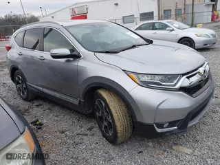 2019 Honda CR-V Touring with VIN 7FARW1H9XKE011269, listed as a IAAI auction lot 41258386 with 53,184 mi miles. Bid and sale history available at carsss.com. Image 1.