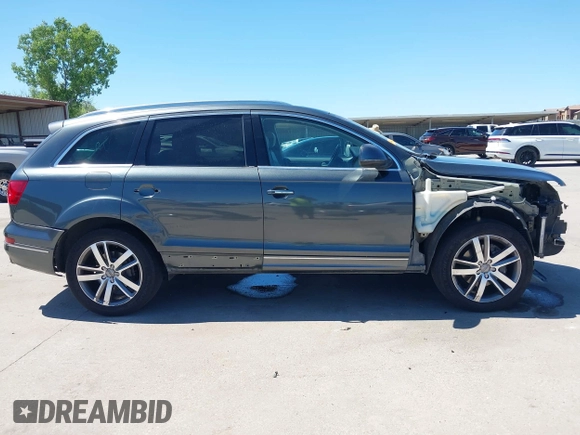 2015 Audi Q7 Premium Plus with VIN WA1LGAFE7FD002275, listed as a IAAI auction lot 42314167 with 144,291 mi miles and . Bid and sale history available at DreamBid. Image 14.