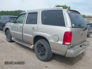 2004 Cadillac Escalade z VIN 1GYEK63N14R177291, wystawiony jako IAAI lot #42263535 z przebiegiem 170 550 mil mil oraz . Historia ofert i sprzedaży dostępna na DreamBid. Obrazek 3.
