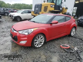 2013 Hyundai Veloster w/Gray Int z VIN KMHTC6AD0DU147454, wystawiony jako Copart lot #57814285 z przebiegiem 91 000 mil mil oraz Szkoda całkowita • Salvage title. Historia ofert i sprzedaży dostępna na DreamBid. Obrazek 1.