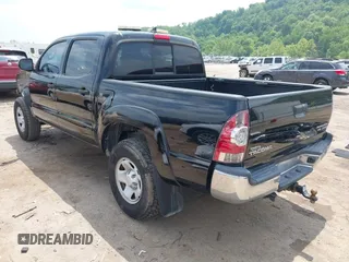 2015 Toyota Tacoma PreRunner with VIN 3TMJU4GN5FM189557, listed as a IAAI auction lot 42387542 with 189,188 mi miles and . Bid and sale history available at DreamBid. Image 3.