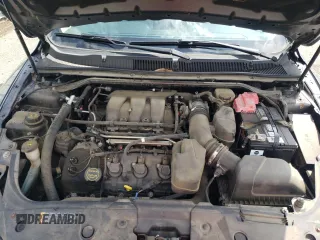 2014 Ford Taurus Limited with VIN 1FAHP2F84EG149622, listed as a Copart auction lot 63764675 with 208,801 mi miles and Salvage title. Bid and sale history available at DreamBid. Image 11.
