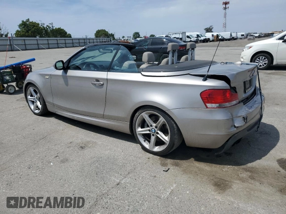 2010 BMW 1 Series 135i with VIN WBAUN9C55AVK41973, listed as a Copart auction lot 54609015 with 144,685 mi miles and Salvage Title. Bid and sale history available at carsss.com. Image 2.
