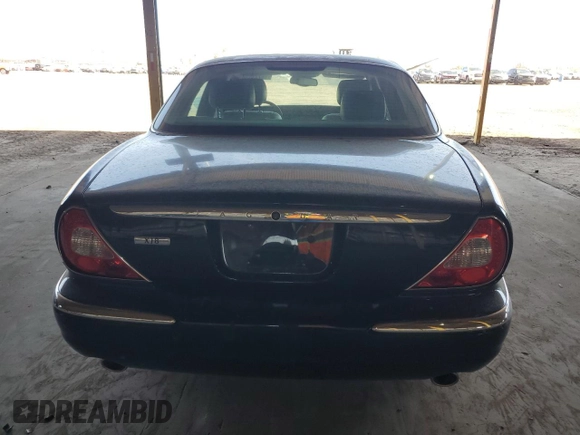 2004 Jaguar XJ with VIN SAJWA71C04SG20211, listed as a Copart auction lot 78713334 with 43,169 mi miles and Clean Title. Bid and sale history available at carsss.com. Image 6.