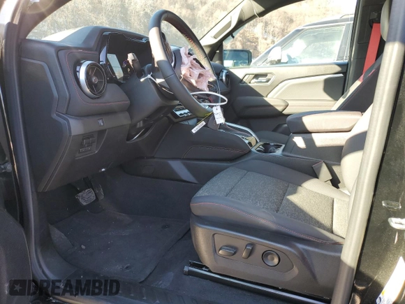 2024 Chevrolet Colorado 4WD Z71 with VIN 1GCPTDEK0R1112392, listed as a Copart auction lot 46505825 with 5,557 mi miles and Salvage Title. Bid and sale history available at carsss.com. Image 7.