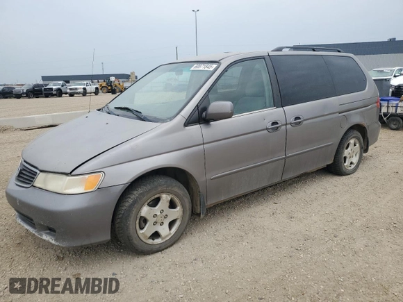 2000 Honda Odyssey EX z VIN 2HKRL186XYH010384, wystawiony jako Copart lot #60871845 z przebiegiem 423 167 mil mil oraz Czysty tytuł • Clean title. Historia ofert i sprzedaży dostępna na DreamBid. Obrazek 1.