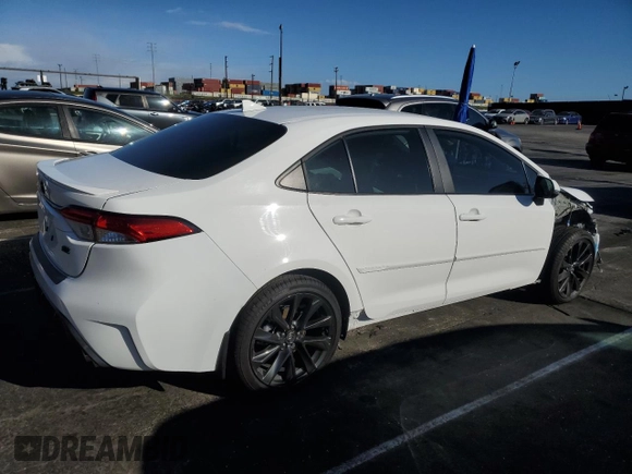 2024 Toyota Corolla SE with VIN 5YFS4MCE7RP190653, listed as a Copart auction lot 47262275 with 9,797 mi miles and Salvage Title. Bid and sale history available at DreamBid. Image 3.