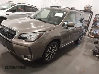 2017 Subaru Forester Touring with VIN JF2SJGTC4HH558808, listed as a IAAI auction lot 41565049 with 79,713 mi miles. Bid and sale history available at carsss.com. Image 20.