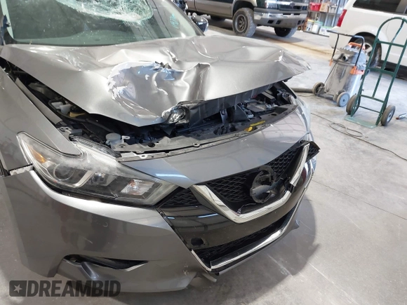 2018 Nissan Maxima SL z VIN 1N4AA6APXJC374220, wystawiony jako IAAI lot #42018130 z przebiegiem 119 776 mil mil oraz . Historia ofert i sprzedaży dostępna na DreamBid. Obrazek 6.