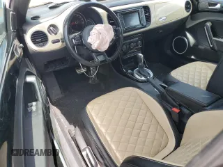 2019 Volkswagen Beetle S с VIN 3VW5DAAT7KM511551, выставлен на аукционе Copart как лот 64180965 с пробегом 65 364 миль миль и Списание • Salvage title. История ставок и продаж доступна на DreamBid. Изображение 8.