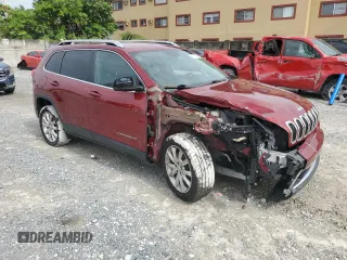 2016 Jeep Cherokee Limited with VIN 1C4PJLDB3GW135716, listed as a Copart auction lot 59718615 with 87,231 mi miles and Salvage title. Bid and sale history available at DreamBid. Image 4.
