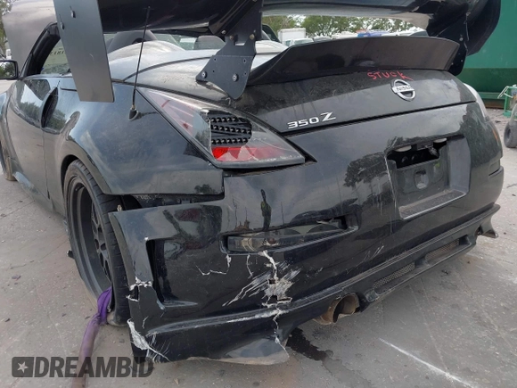 2004 Nissan 350Z Touring z VIN JN1AZ36A14M253275, wystawiony jako IAAI lot #42181345 z przebiegiem 63 886 mil mil oraz . Historia ofert i sprzedaży dostępna na DreamBid. Obrazek 6.