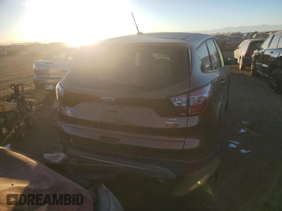 2017 Ford Escape SE with VIN 1FMCU9GD7HUE89317, listed as a Copart auction lot 83536654 with 121,939 mi miles and Clean Title. Bid and sale history available at carsss.com. Image 6.