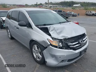 2014 Honda Odyssey LX z VIN 5FNRL5H28EB064426, wystawiony jako IAAI lot #42207634 z przebiegiem 169 706 mil mil oraz . Historia ofert i sprzedaży dostępna na DreamBid. Obrazek 1.