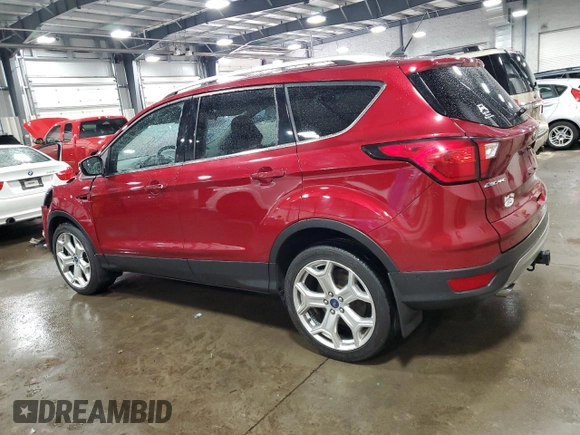 2019 Ford Escape Titanium with VIN 1FMCU9J9XKUA41715, listed as a Copart auction lot 57483725 with 30,644 mi miles and Salvage title. Bid and sale history available at DreamBid. Image 2.