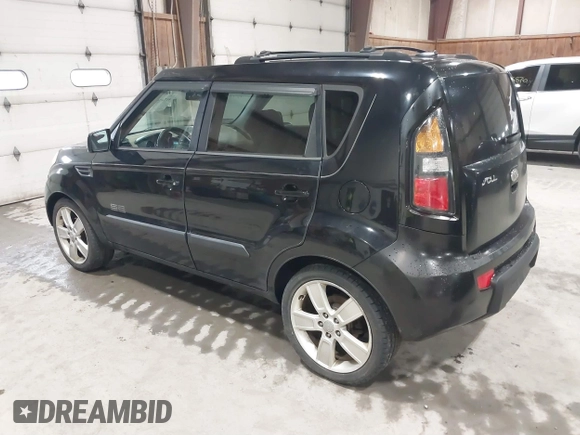 2011 Kia Soul + with VIN KNDJT2A2XB7196479, listed as a IAAI auction lot 41747551 with 205,849 mi miles. Bid and sale history available at carsss.com. Image 3.