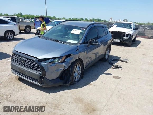 2023 Toyota Corolla Cross LE with VIN 7MUCAAAGXPV045651, listed as a IAAI auction lot 42006289 with 23,282 mi miles and . Bid and sale history available at DreamBid. Image 2.