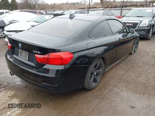 2014 BMW 4 Series 428i with VIN WBA3N7C50EF718339, listed as a IAAI auction lot 41403096 with 143,478 mi miles and . Bid and sale history available at carsss.com. Image 4.