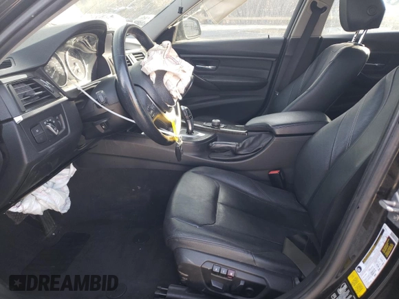 2013 BMW 3 Series 328i xDrive with VIN WBA3B3C56DF541618, listed as a Copart auction lot 49342235 with 166,747 mi miles and Salvage title. Bid and sale history available at DreamBid. Image 7.