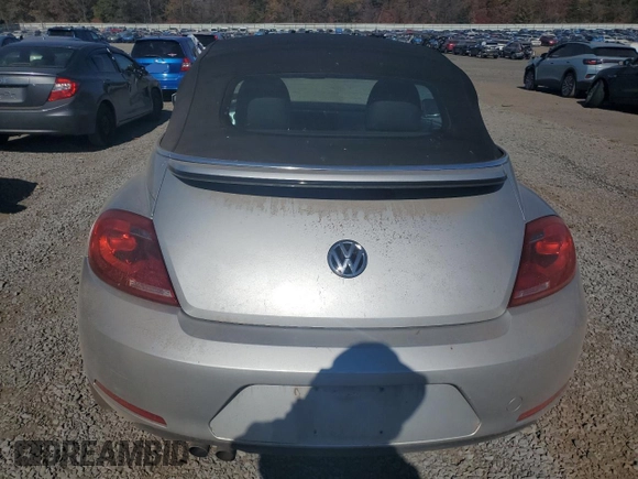 2013 Volkswagen Beetle 2.5L with VIN 3VW5P7ATXDM803952, listed as a Copart auction lot 76971934 with 211,449 mi miles and Salvage Title. Bid and sale history available at DreamBid. Image 6.