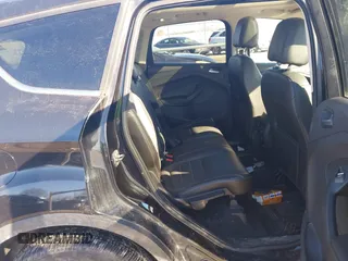 2015 Ford Escape Titanium with VIN 1FMCU9J91FUC68152, listed as a IAAI auction lot 41620725 with 195,122 mi miles. Bid and sale history available at carsss.com. Image 8.