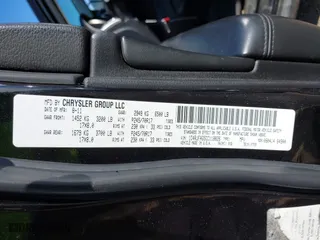 2012 Jeep Grand Cherokee Laredo with VIN 1C4RJFAG5CC118826, listed as a IAAI auction lot 42039801 with 158,153 mi miles. Bid and sale history available at carsss.com. Image 9.