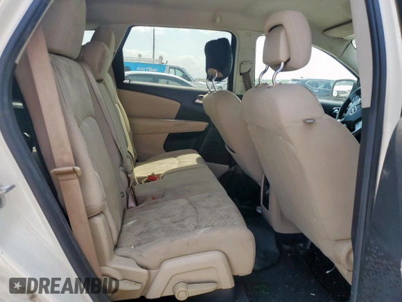 2012 Dodge Journey SXT z VIN 3C4PDCBG9CT213423, wystawiony jako Copart lot #65246735 z przebiegiem 319 806 mil mil oraz Szkoda całkowita • Salvage title. Historia ofert i sprzedaży dostępna na DreamBid. Obrazek 11.
