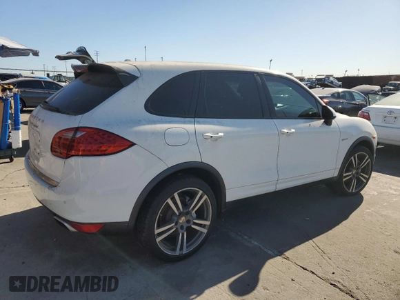 2012 Porsche Cayenne S Hybrid z VIN WP1AE2A23CLA93180, wystawiony jako Copart lot #88579675 z przebiegiem 50 909 mil mil oraz Tytuł czysty. Historia ofert i sprzedaży dostępna na DreamBid. Obrazek 3.