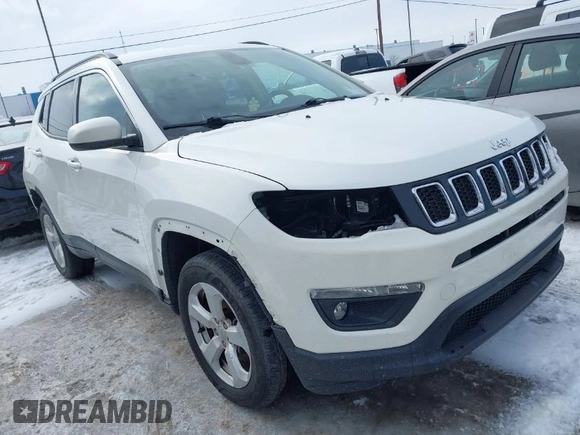 2019 Jeep Compass Latitude with VIN 3C4NJDBB0KT813014, listed as a IAAI auction lot 41560221 with 63,307 mi miles. Bid and sale history available at carsss.com. Image 1.