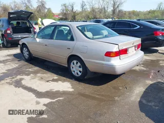 2001 Toyota Camry CE with VIN 4T1BG22K11U114688, listed as a IAAI auction lot 42065715 with 150,181 mi miles. Bid and sale history available at carsss.com. Image 3.