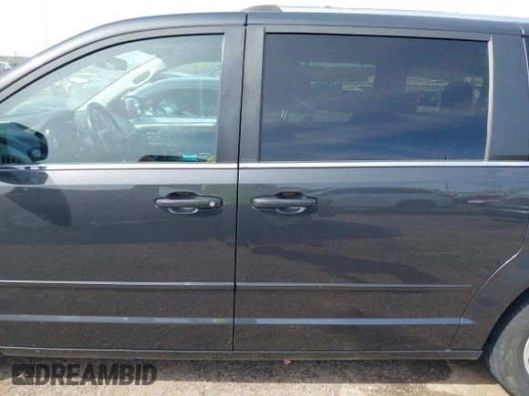 2011 Dodge Grand Caravan Crew with VIN 2D4RN5DG3BR660235, listed as a IAAI auction lot 41945522 with 148,924 mi miles and . Bid and sale history available at DreamBid. Image 14.